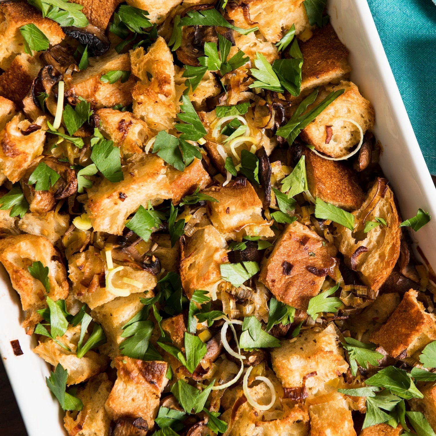 A baking dish with bacon and leek stuffing.