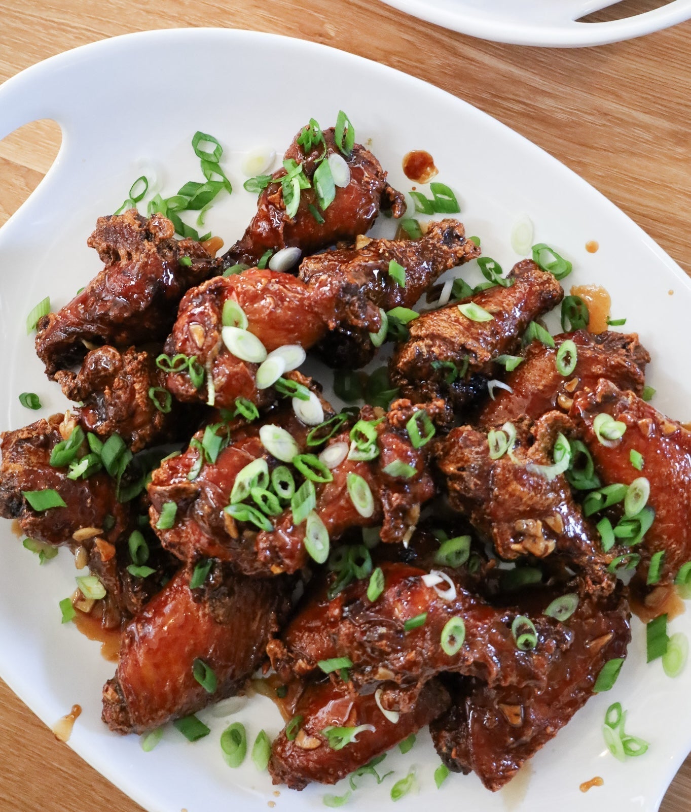 A plate of fish sauce-glazed chicken wings.