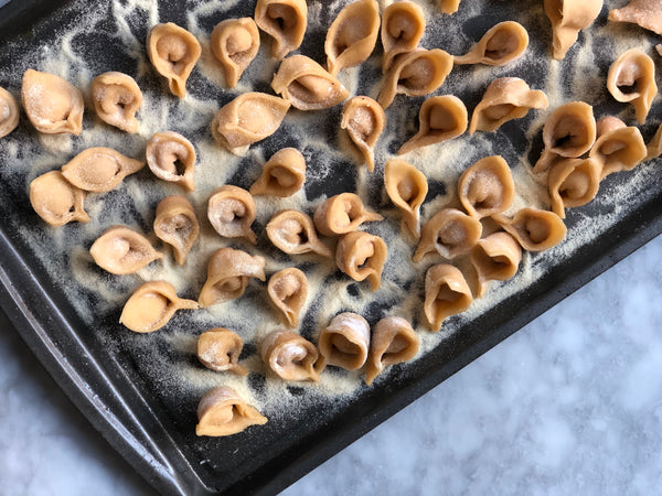 Sweet Potato Tortellini en Brodo with Infused Rosemary Salt