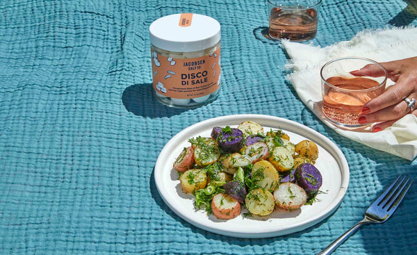 A plate of potato salad, a jar of 