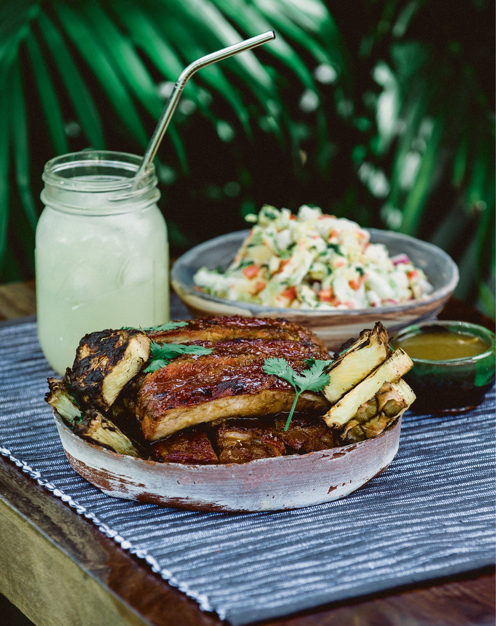 Wasabi, Honey, and Soy-Glazed Baby Back Ribs with Pineapple, Jicama, and Pickled Ginger Slaw