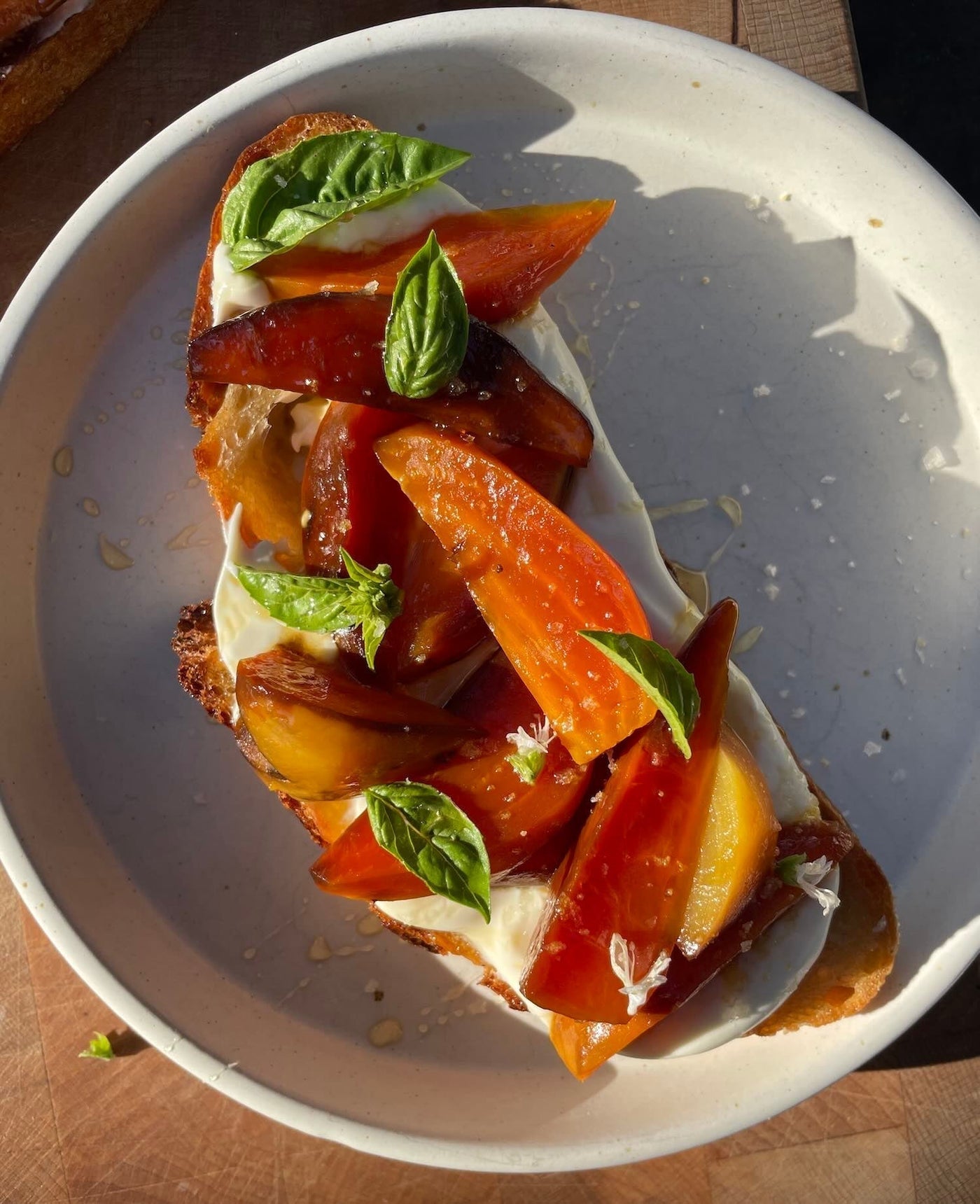 Open-faced toast with roasted beets, a drizzle of honey and flake salt 