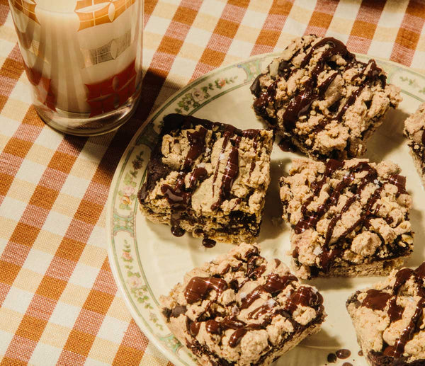 Slices of snickerdoodle fudge bars on a plate.