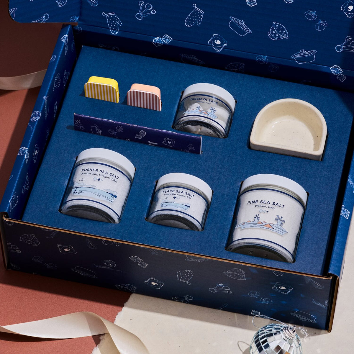THE STARTER KIT
The perfect giftable intro to all things salt. A curated collection of our most beloved salts paired with insights, techniques and tools to help you kickstart your kitchen exploration.
$95