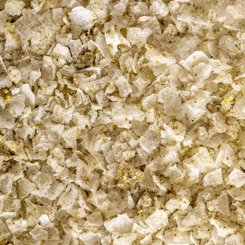 Close up of Jacobsen Salt Co. Sansho Salt, large flakes with a light green color.