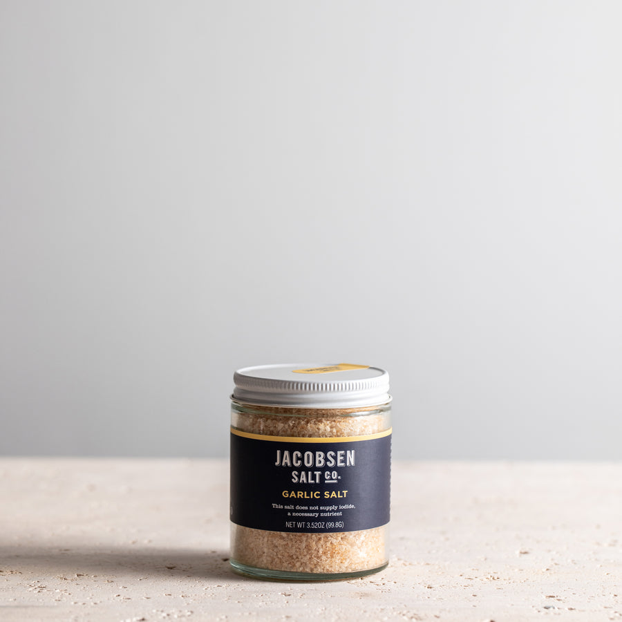 A 3.52 oz jar of Jacobsen Infused Garlic Salt.