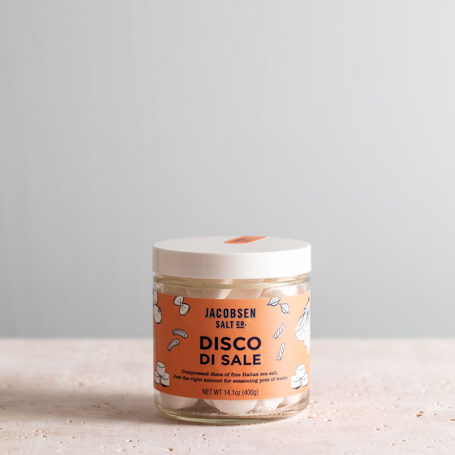 14.1 oz jar of Jacobsen Salt Co Disco di Sale, filled with quarter sized salt discs