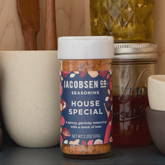 Jar of Jacobsen House Special Seasoning on pantry shelf.