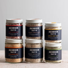 Jacobsen Salt Co. bundle including Infused Pinot Noir Salt, Infused Black Garlic Salt, Infused Lemon Zest Salt, Infused Habanero Salt, Infused Black Pepper Salt and Infused Rosemary Salt