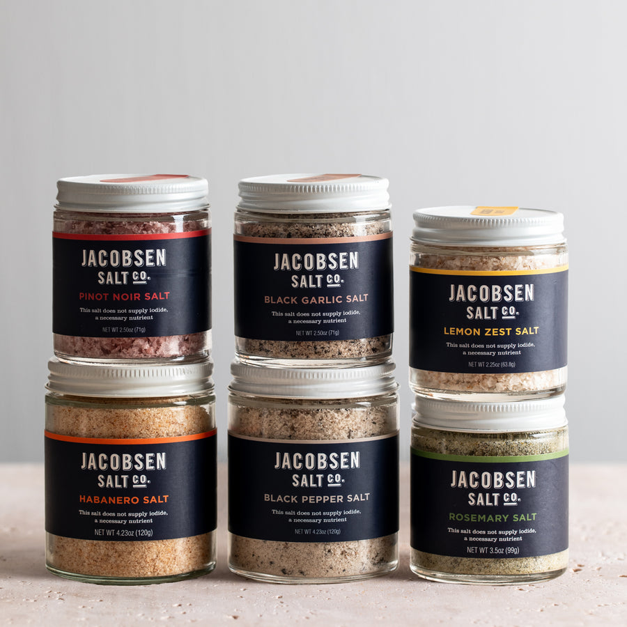 Jacobsen Salt Co. bundle including Infused Pinot Noir Salt, Infused Black Garlic Salt, Infused Lemon Zest Salt, Infused Habanero Salt, Infused Black Pepper Salt and Infused Rosemary Salt