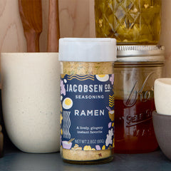 Jar of Jacobsen Ramen Seasoning on pantry shelf.