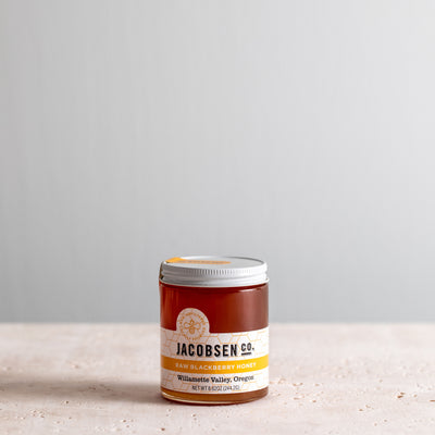 8.62 ounce jar of Jacobsnen Raw Blackberry Honey