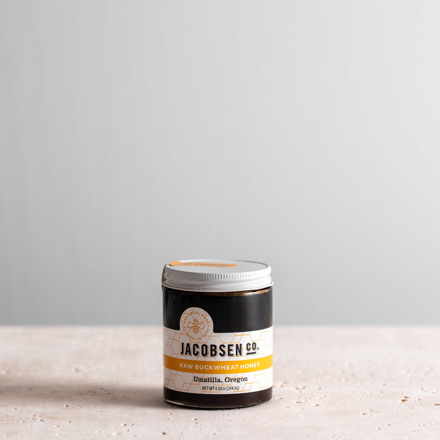 8.62 oz jar of Jacobsen Raw Blackberry Honey