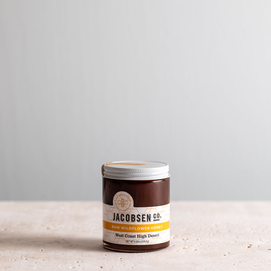 8.62 ounce jar of Jacobsen Raw Wildflower Honey