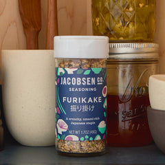 Jar of Jacobsen Furikake on pantry shelf.