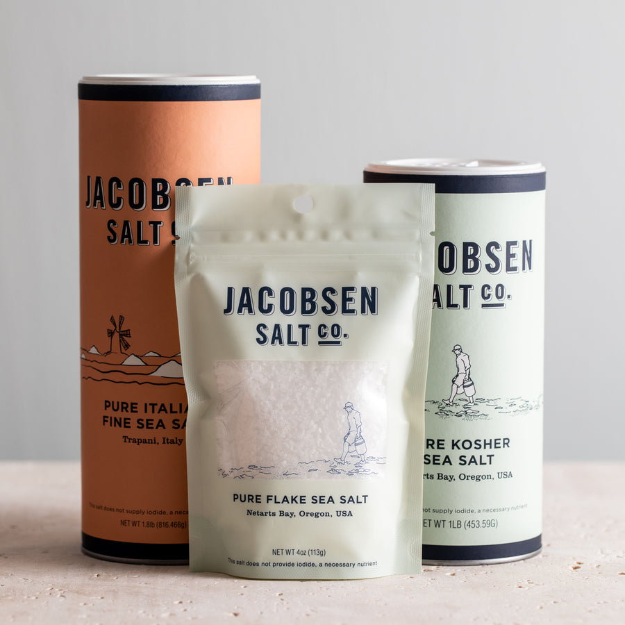 Trio of Jacobsen Pure Sea Salts, including Pure Italian Sea Salt canister, Pure Flake Sea Salt bag and Pure Kosher Sea Salt canister