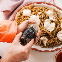 Jacobsen Tellicherry Peppercorns ground over pasta and cheese